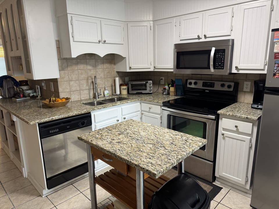Condo, 2 Bedrooms | Private kitchen | Full-size fridge, microwave, oven, stovetop