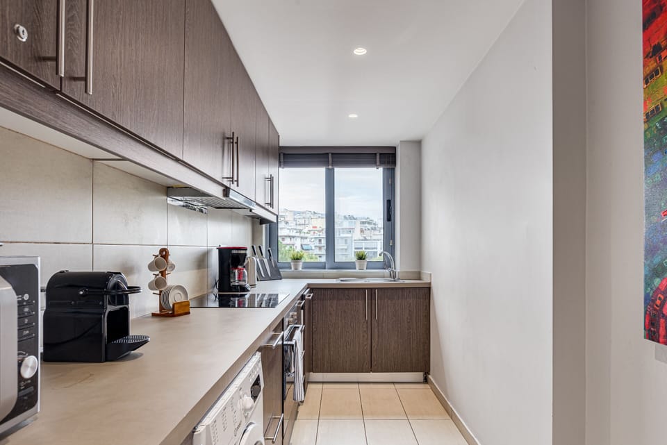 Acropolis Boutique Residence | Private kitchen | Full-size fridge, microwave, oven, stovetop