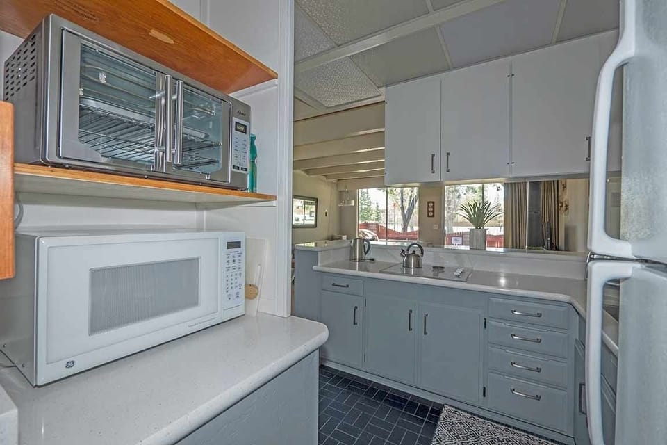 Condo, 1 Bedroom | Private kitchen | Full-size fridge, microwave, stovetop, dishwasher