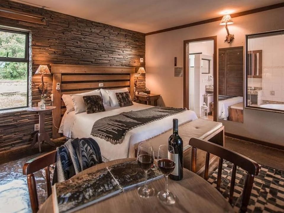 Superior Chalet (Jacuzzi) | Minibar, in-room safe, individually decorated, desk