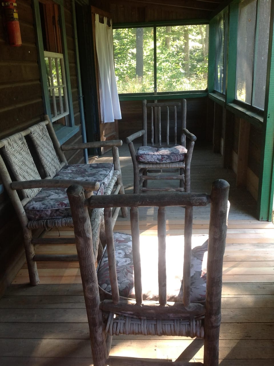 Screened porch for Betty and Helen. Stay and sit awhile.
