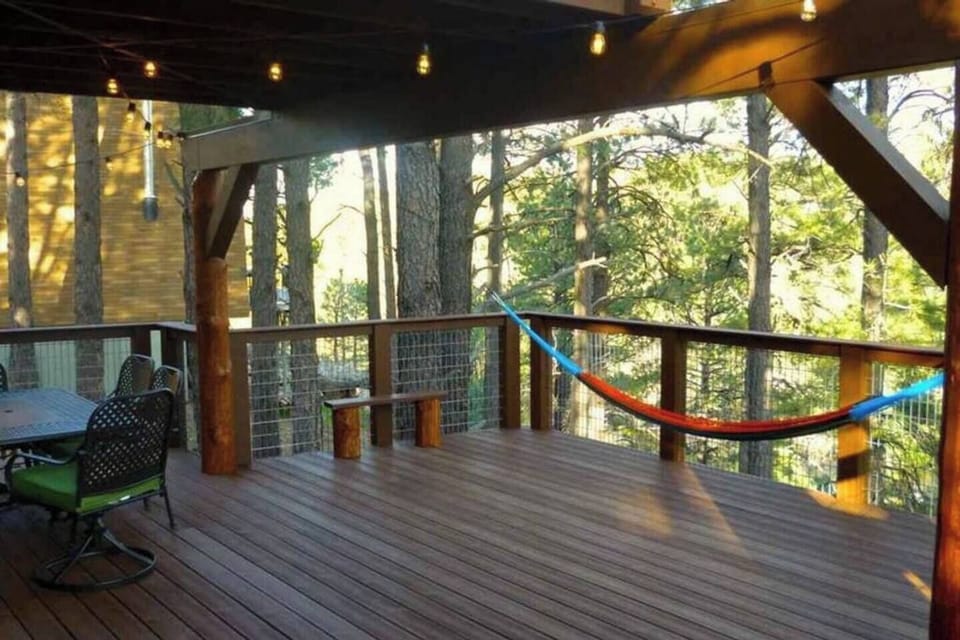 Peeled Ponderosa Pine Poles support the Large Balcony and create the perfect ambiance.
