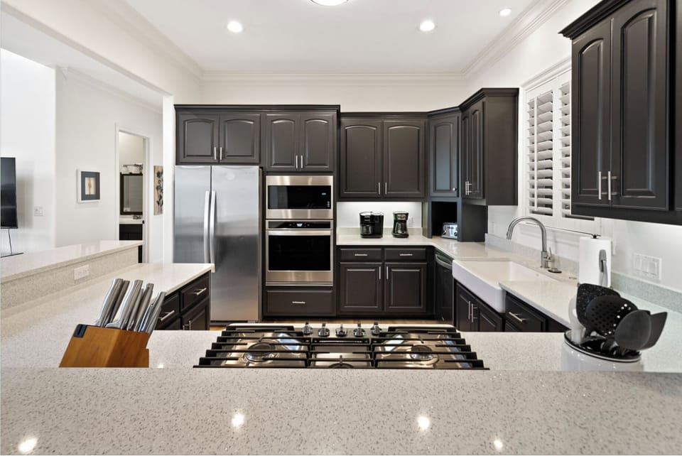 Your fully equipped gourmet kitchen features granite countertops, stainless steel appliances, and everything you need to create memorable meals during your stay.