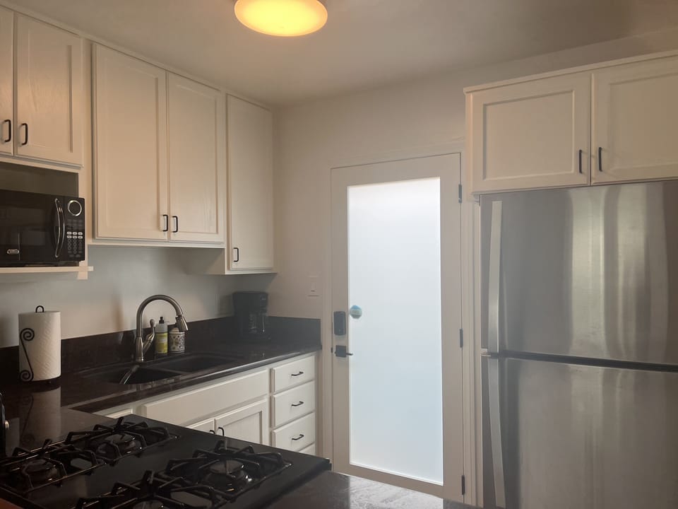 Entry door, and Kitchen with everything you need to make you feel at home!