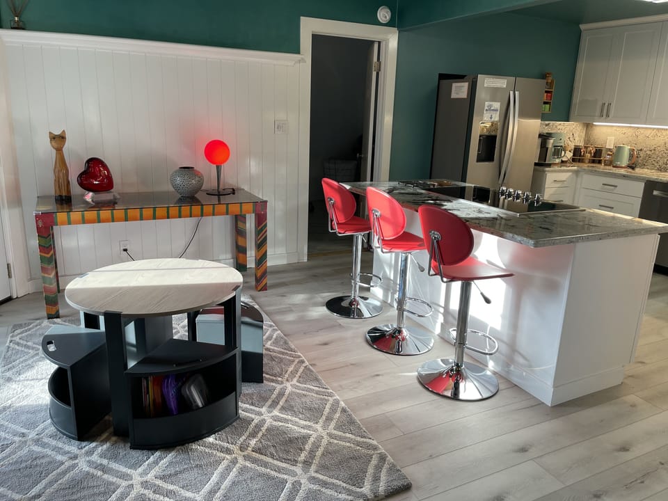 Kids Dinning and Play Area off the kitchen. High Chairs available as well.