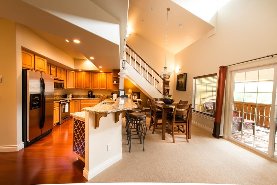 Dining area with bar sitting 