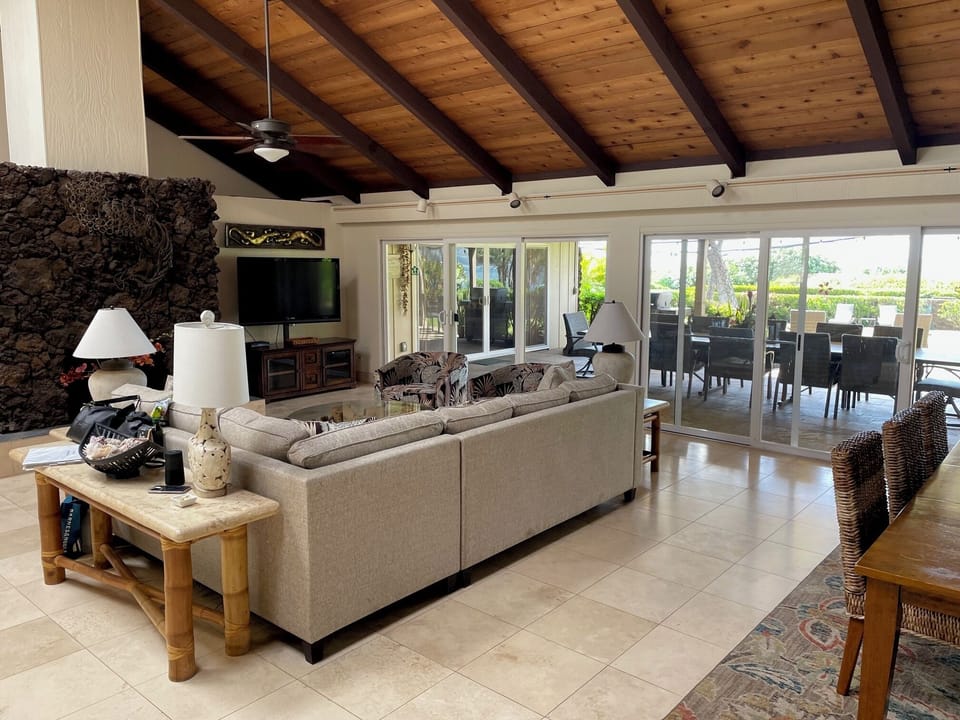 great room looking out to the lanai, pool, and ocean. 