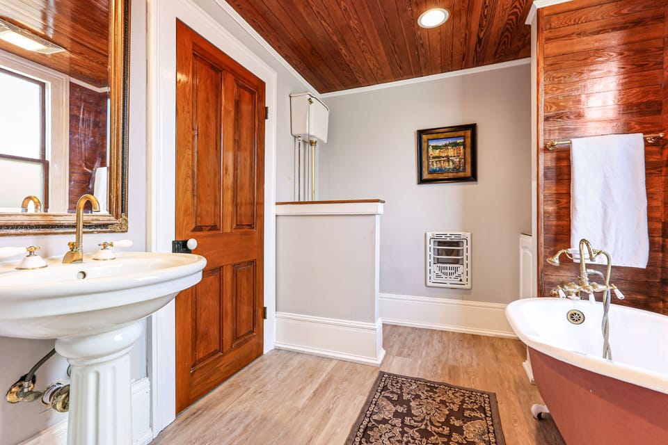 Downstairs Bathroom connected to laundry room and King Bedroom. 