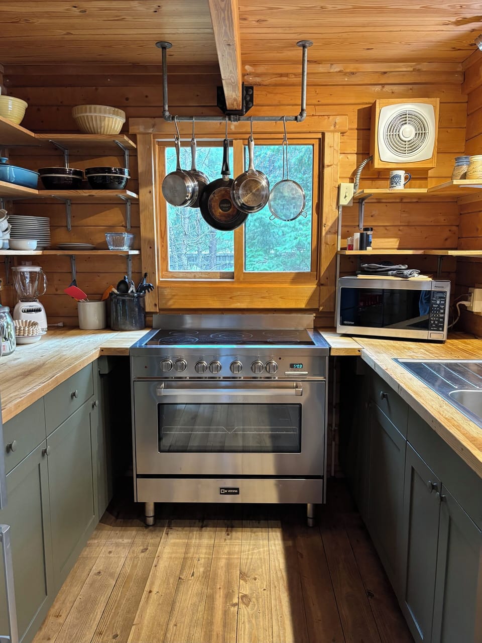 there is a dishwasher- just outside the photo
