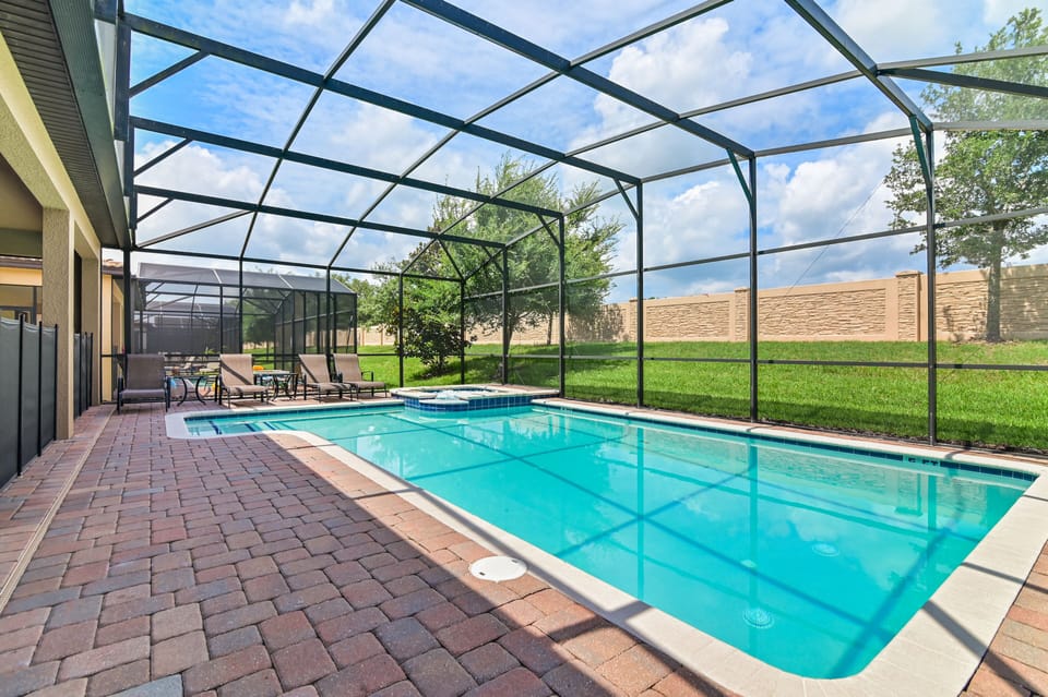The oversize private pool is nearly 40 ft long!