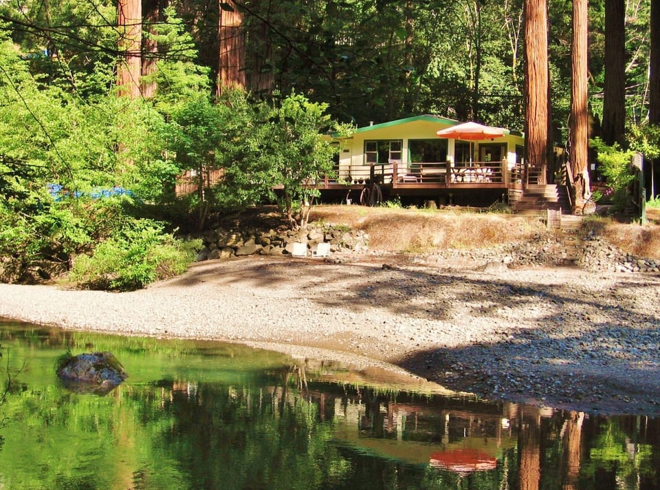 Beautifully sited in a sunny opening of the coastal redwood forest.