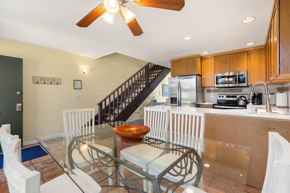 Spacious dining area beside the living room for shared meals.