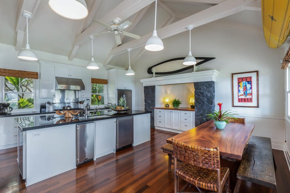Kitchen with under the counter ice maker, beverage refrigerator and wine cellar