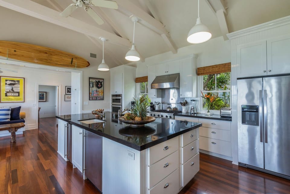 Kitchen with 6 burner stovetop, large wall oven convection/microwave wall unit.
