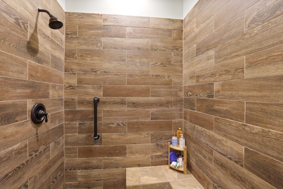 one of three full bathrooms on the first floor. 