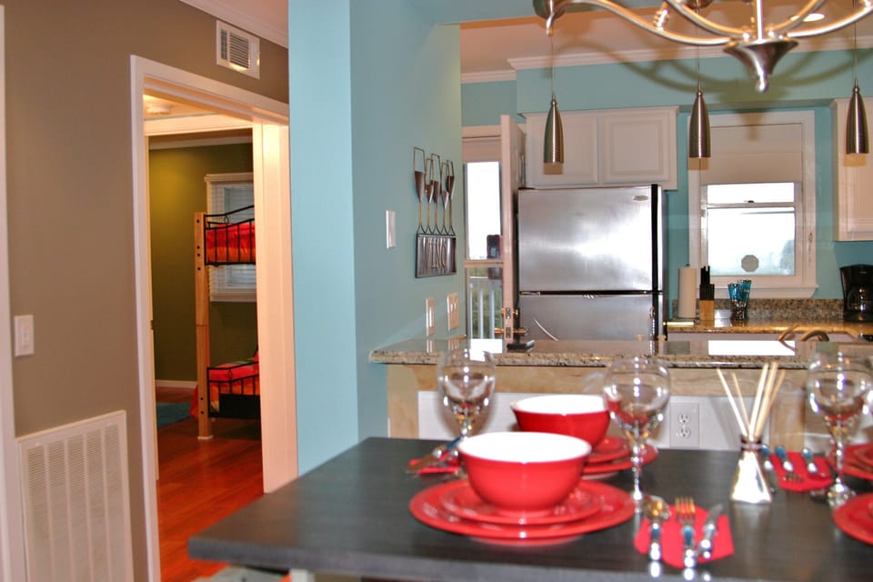 View into kitchen and second bedroom. Note: Second full bathroom is to the left.