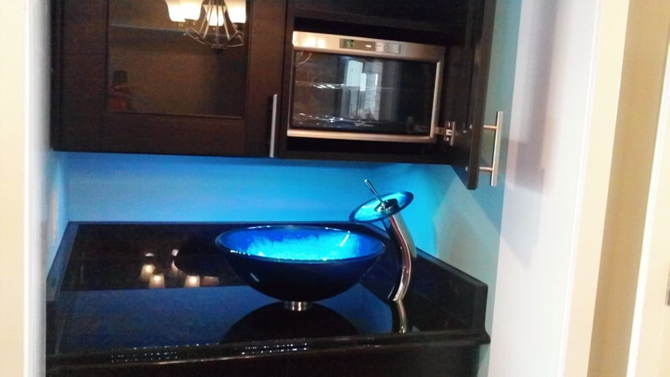 Mini bar with wine cooler and really cool sink!
