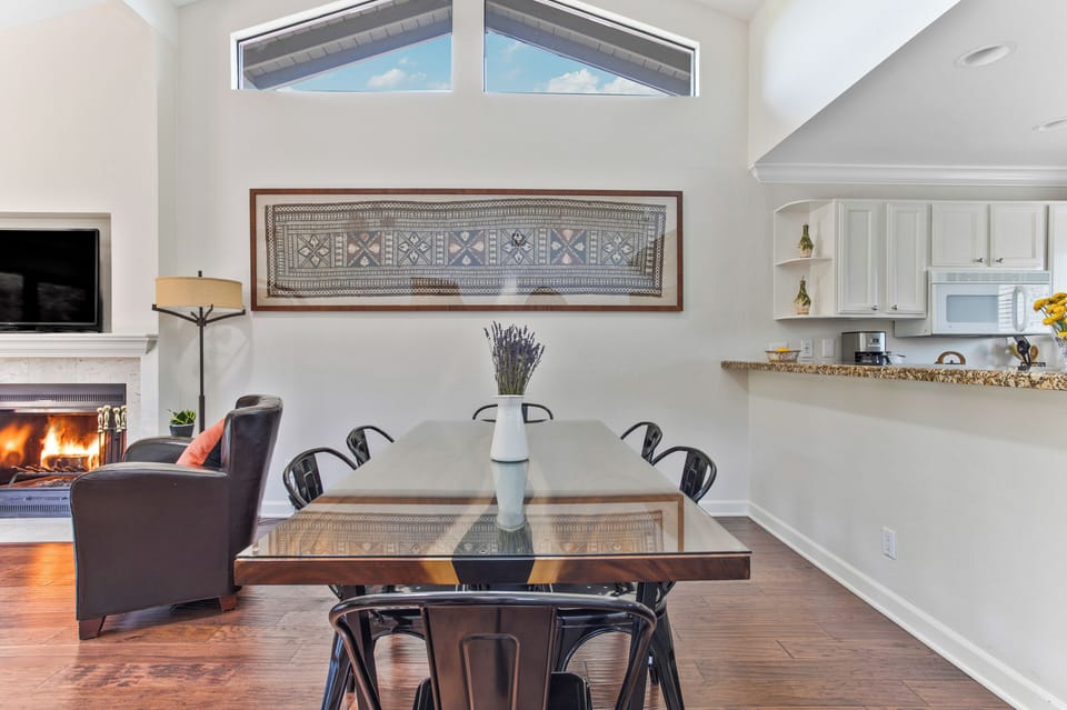 Open light filled space where the kitchen, dining and living areas flow together