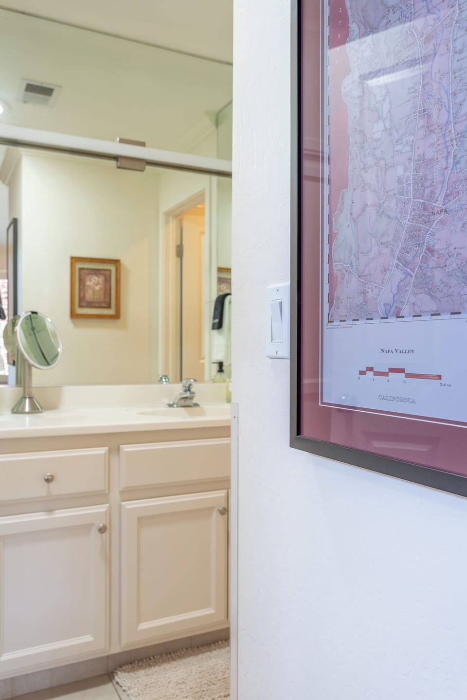 View of the adjoining bathroom from primary bedroom.