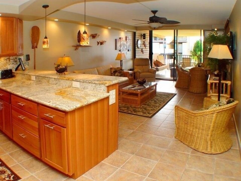 Kitchen has been totally remodeled-Living area opens up to the extra large lanai