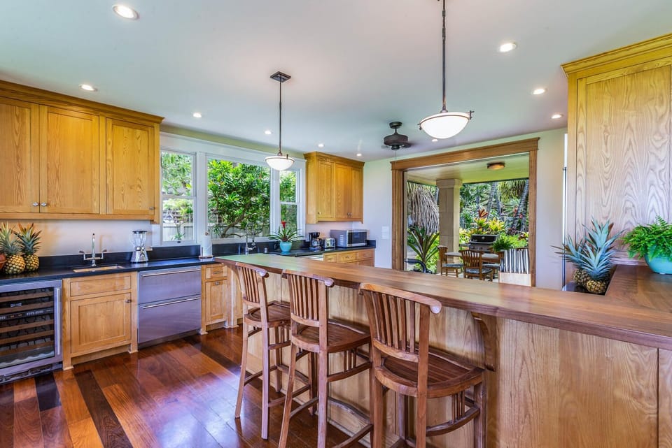 Chef's delight, the kitchen and bar area, wine cellar, beverage fridge...