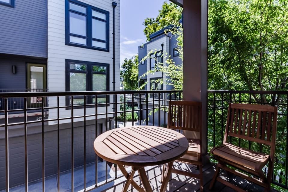 Relax with a glass of wine on the balcony off the dining room.  (4 chairs)