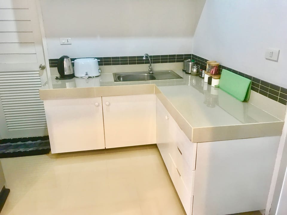 Luxury Villa | Private kitchen | Full-size fridge, microwave, stovetop, electric kettle