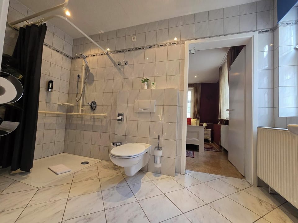 Shower, free toiletries, hair dryer, towels