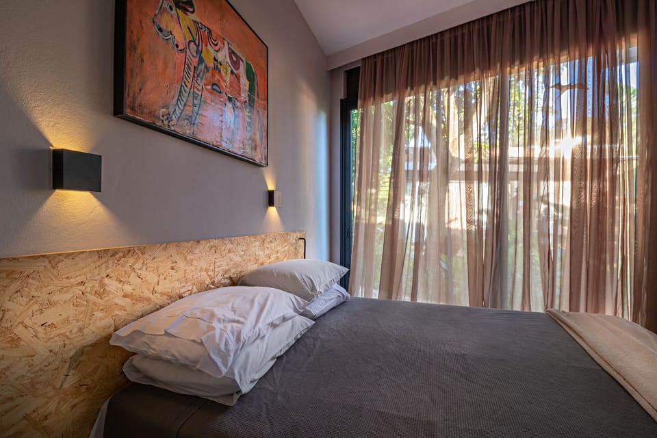 Design Bungalow, 1 Bedroom, Accessible, Garden View | Minibar, blackout drapes, free WiFi, bed sheets