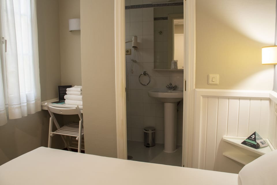 Desk, blackout drapes, free WiFi, bed sheets
