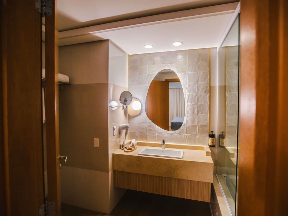 Junior Suite, 1 King Bed, Sea View | Minibar, in-room safe, desk, soundproofing