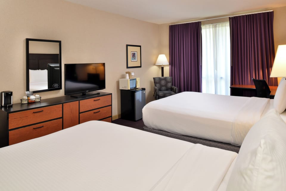 Standard Room, 2 Queen Beds, Non Smoking | In-room safe, iron/ironing board, free WiFi, bed sheets