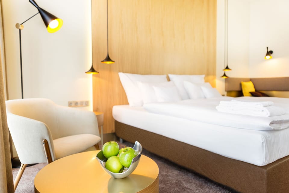 Deluxe Triple Room | Hypo-allergenic bedding, minibar, in-room safe, desk