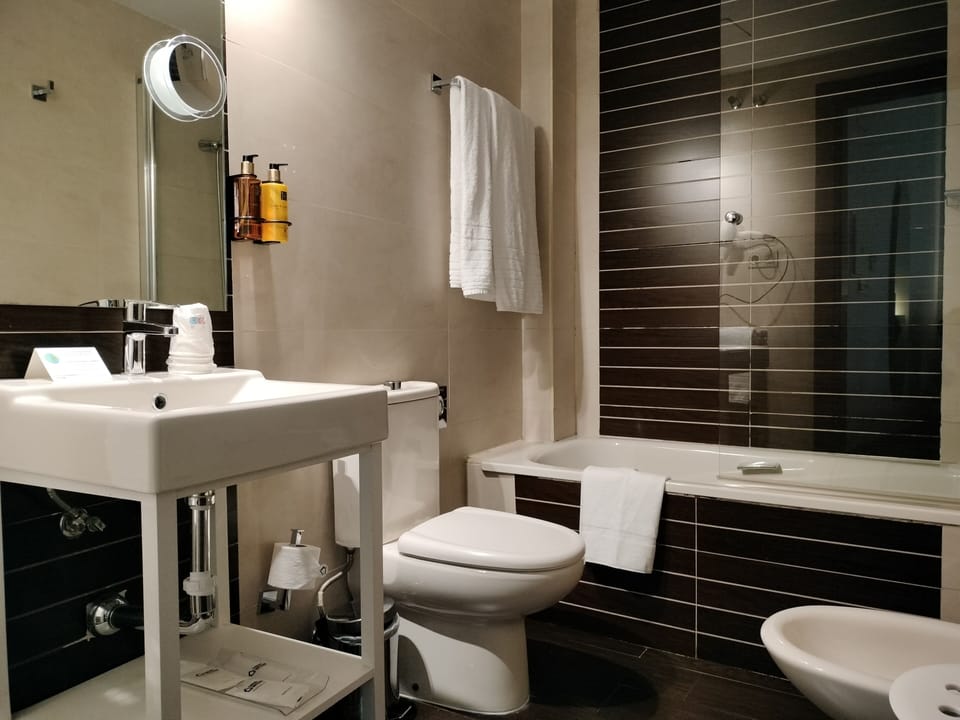 Family Quadruple Room, Balcony | Bathroom | Hair dryer, bidet, towels, soap