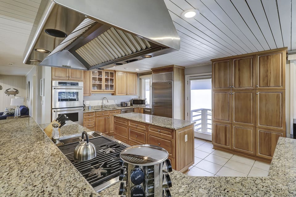 Large fully-stocked kitchen with high-end appliances