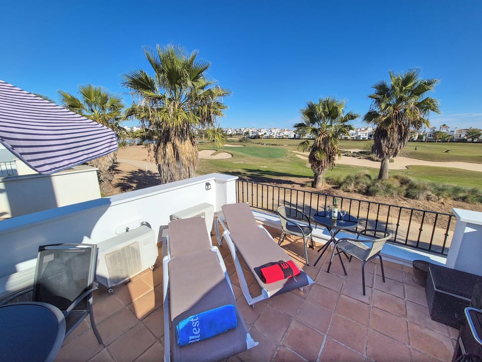 Frontline view over the golf course. We have four sun loungers.