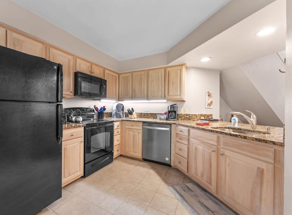 Kitchen: range, refrigerator, dishwasher, disposal, large kitchenaid mixer, etc