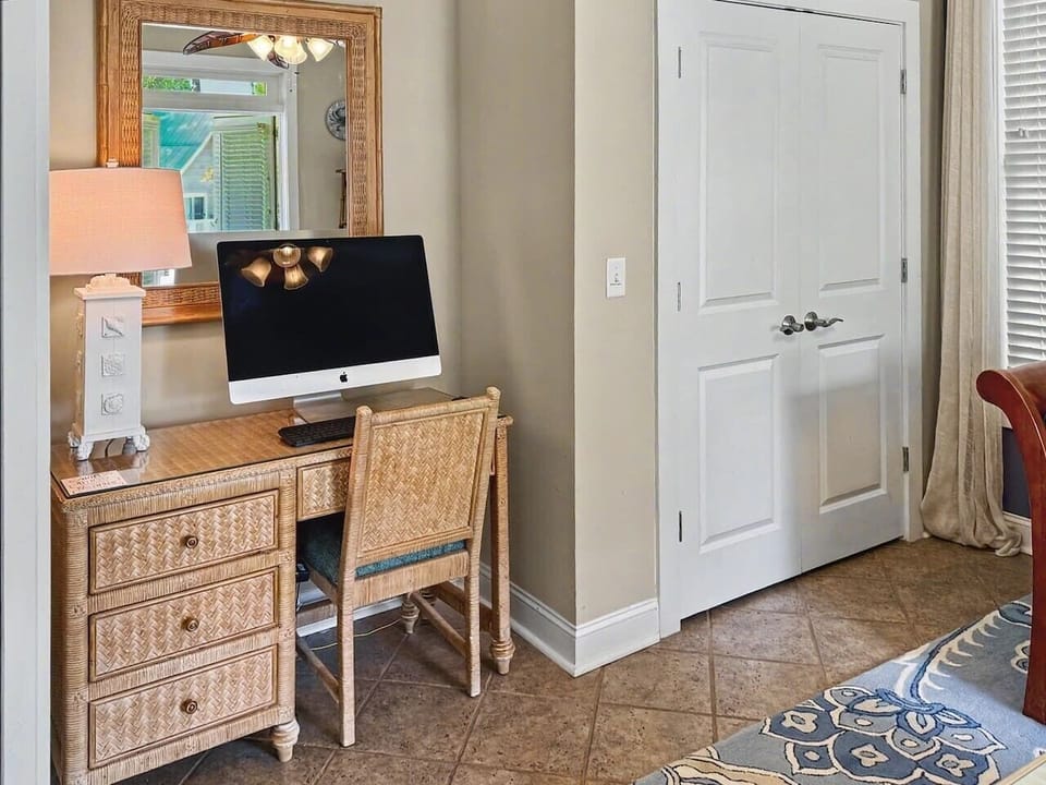Need to catch up on emails or a little work during your stay? A desk and computer are available, offering a comfortable space to stay connected while enjoying life on Fripp Island.