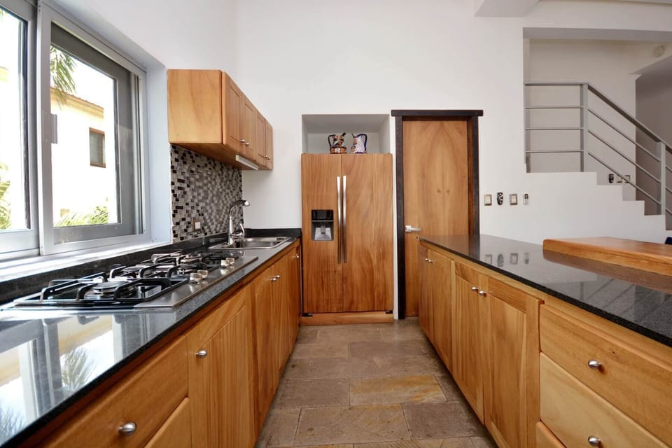 Main Area: Open Kitchen - Laundry Room is through the Door