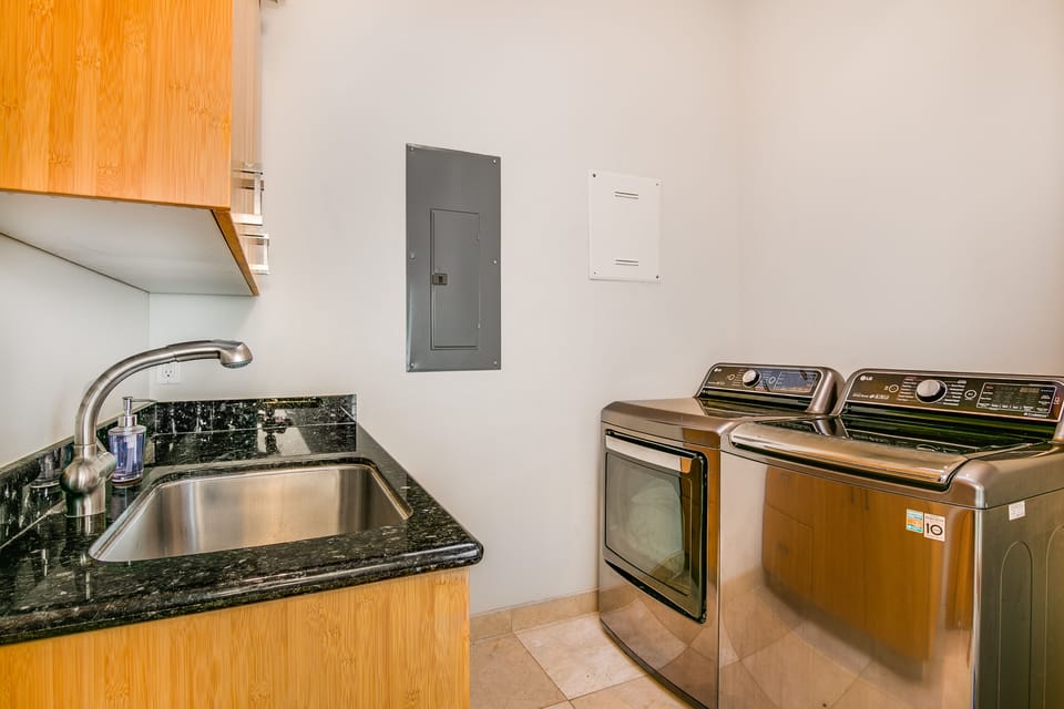 Laundry room with top of the line washer and dryer