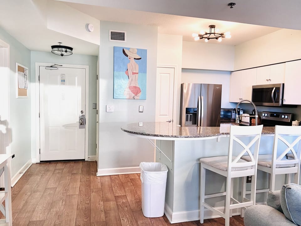 Front door ad kitchen with all stainless steel upgraded appliances 