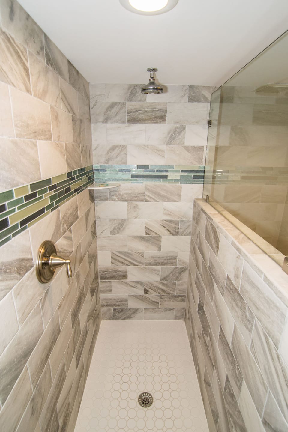 Spacious walk-in rain shower in master bathroom