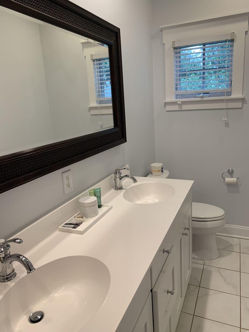 Double sinks and a custom shower in the St Barth's Master Suite.