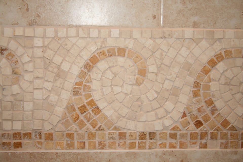 Detail of custom tile in all bathrooms.