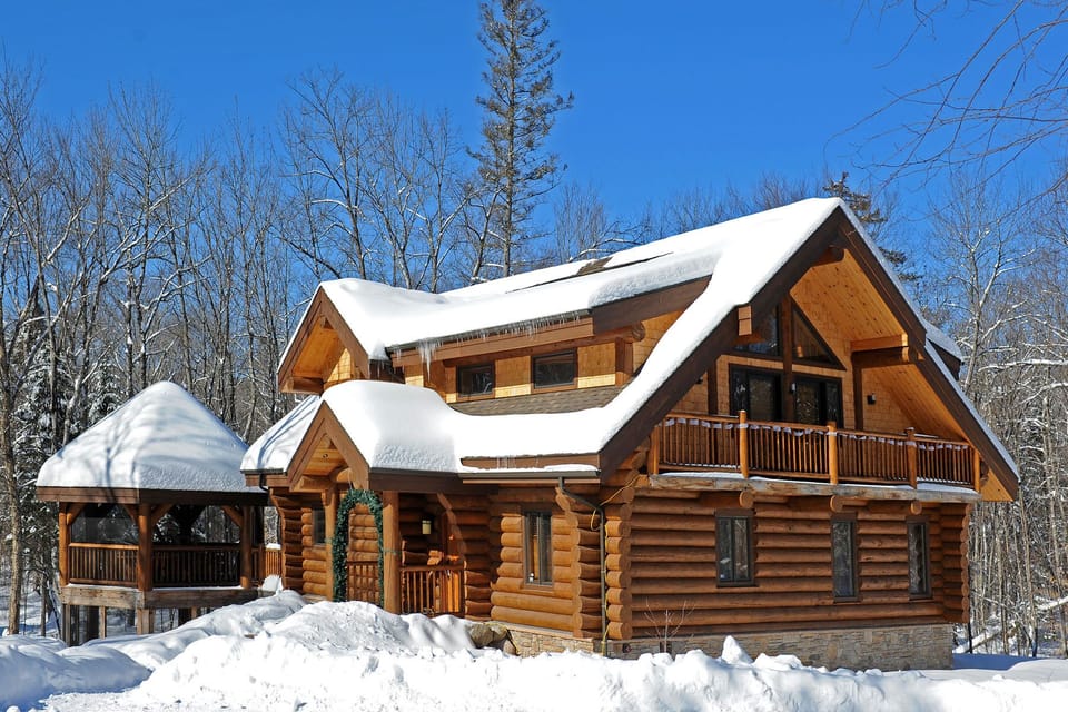 A warm cabin on a beautiful winter's day. 