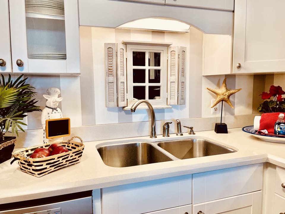 Renovated kitchen with QUARTZ counters. Fully stocked--but who wants to cook? 😁