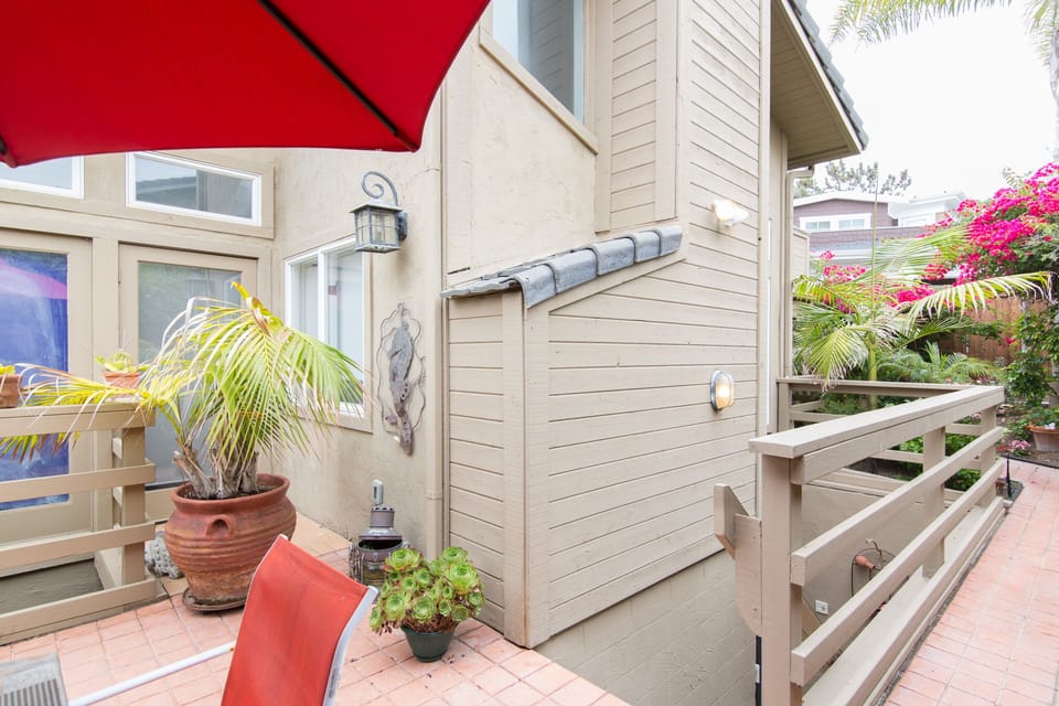 Stairs lead down to unit 