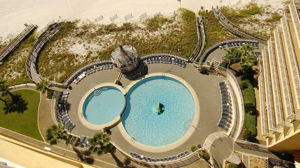 View downward from balcony. The only thing between you and the ocean!