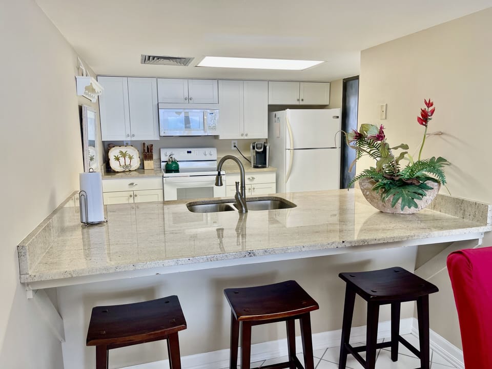 Kitchen bar is a perfect space to add seating for casual dining or work area