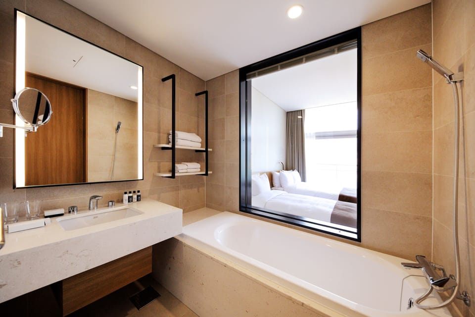 Separate tub and shower, free toiletries, hair dryer, bathrobes
